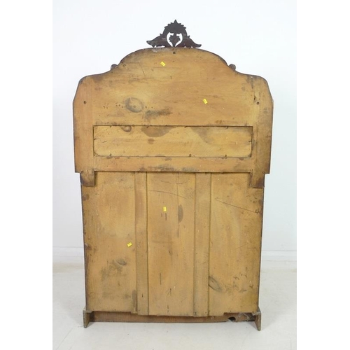 921 - A Victorian mahogany chiffonier, the gallery back with carved surmount and single shelf, below twin ... 