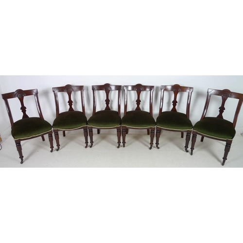 922 - A set of six Victorian Aesthetic mahogany dining chairs, bowed backs with carved decoration, upholst... 