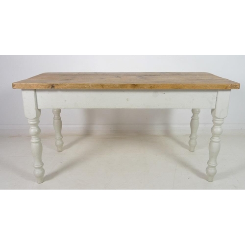 924 - A pine kitchen table, late 20th century, with scrubbed surface, white painted lower section, turned ... 