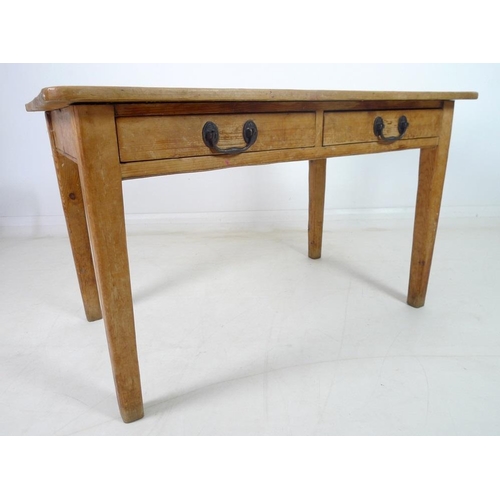 926 - An early 20th century pine kitchen table with two drawers, raised on square section tapering legs, 1... 