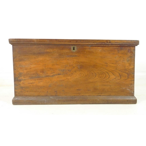 934 - A Victorian oak blanket chest, with candle box and metal carrying handles, 84 by 47 by 43cm high.