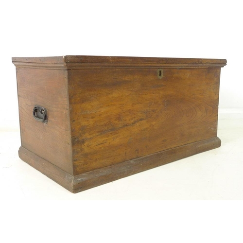 934 - A Victorian oak blanket chest, with candle box and metal carrying handles, 84 by 47 by 43cm high.