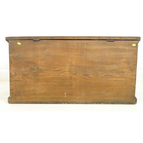 934 - A Victorian oak blanket chest, with candle box and metal carrying handles, 84 by 47 by 43cm high.