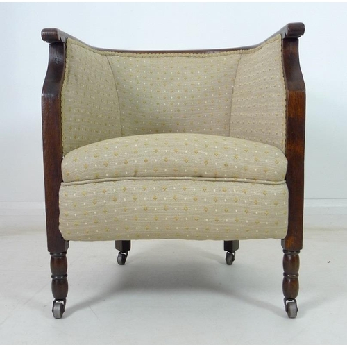 935 - An Edwardian mahogany part salon suite of tub armchair and small settee, upholstered in old gold col... 