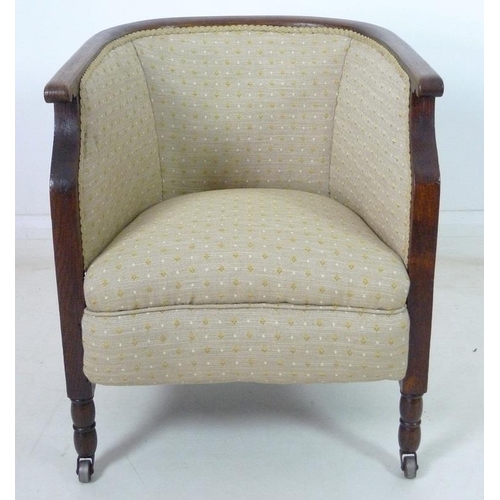 935 - An Edwardian mahogany part salon suite of tub armchair and small settee, upholstered in old gold col... 