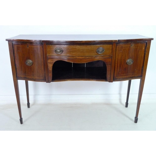 938 - A George III mahogany, line inlaid and crossbanded sideboard, with serpentine shaped front, cupboard... 