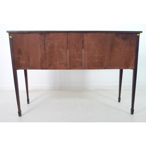 938 - A George III mahogany, line inlaid and crossbanded sideboard, with serpentine shaped front, cupboard... 