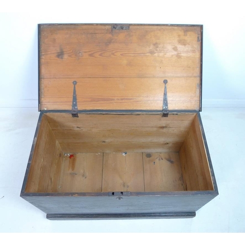 941 - A Victorian stained pine blanket chest, with metal carrying handles, 85 by 45 by 49cm high.