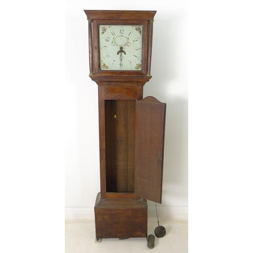 943 - An early 19th century oak long case clock, 30 hour movement striking on a bell, white painted dial, ... 