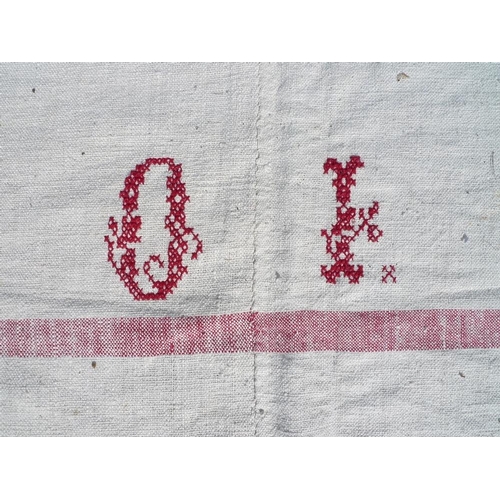 945 - A French linen apple catching sheet, mid 20th century, with woven red line detail and initials, 224 ... 