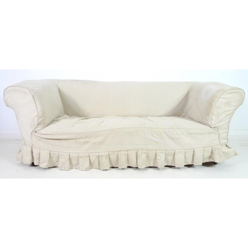 946 - A Victorian beech framed Chesterfield settee, three seater, with turned front legs and brown ceramic... 