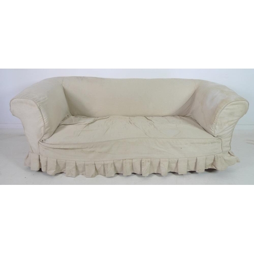 946 - A Victorian beech framed Chesterfield settee, three seater, with turned front legs and brown ceramic... 