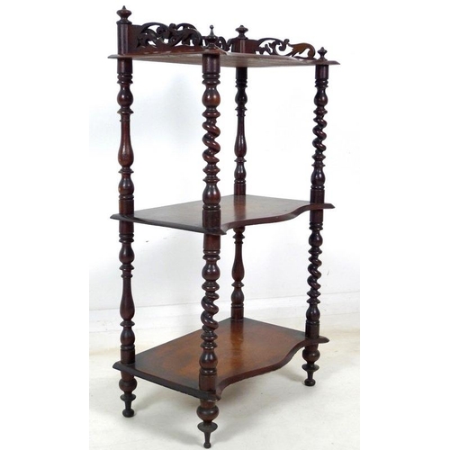 946A - A Victorian mahogany whatnot with pierced fretwork sides to top shelf, barley twist supports, three ... 