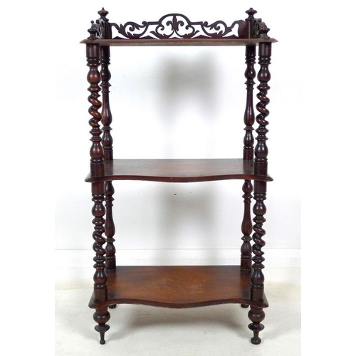 946A - A Victorian mahogany whatnot with pierced fretwork sides to top shelf, barley twist supports, three ... 