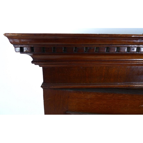 948 - A mid 20th century small mahogany and oak two door wardrobe, dentil moulded cornice, ogee bracket fe... 