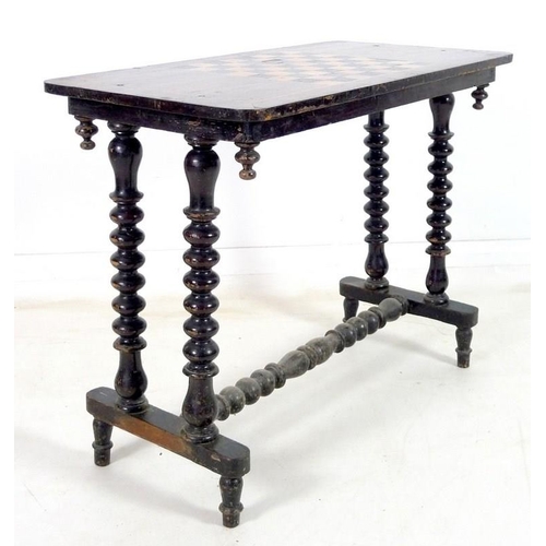 953 - A Victorian games table mahogany, fruitwood and ebonised, with chess board to the surface, on a bobb... 