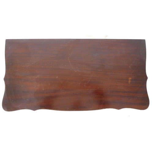 954 - A 19th century mahogany carved table, shaped fold over surface over a plain frieze, raised on chamfe... 