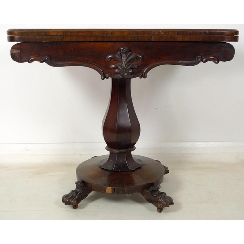 956 - An early Victorian rosewood card table, fold over surface with circular green baize above applied mo... 