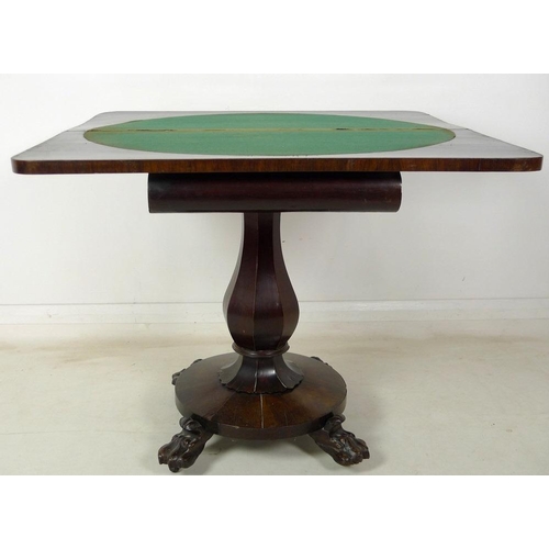 956 - An early Victorian rosewood card table, fold over surface with circular green baize above applied mo... 