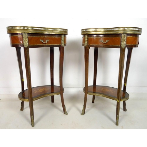 958 - A pair of French kidney shaped bedside cabinets, 20th century, in the Louis XV style, with single dr... 