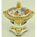 A Royal Crown Derby pot pourri, 1806 to 1825, the cover topped with pineapple finial, the body decor... 