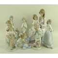 A group of four Lladro figurines, comprising First Sampler, 5767, 30cm, Sweet and Shy, 6754, 23cm, T... 