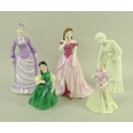 A group of five porcelain figurines, comprising Royal Worcester 'First Steps' modelled by Glenis Dev... 