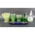 A collection of glass items, including three uranium glass vases, one of splash design, the other Ar... 