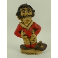 A John Hughes ceramic Grogg figure of rugby player Drop Kick Davies, incised to foot and signed to b... 