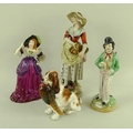 A collection of ceramic figures, comprising a 19th century Staffordshire reversible figurine, 'Gin a... 