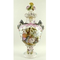 A large Berlin porcelain pot pourri vase and cover, the ogee form body painted with figures in garde... 