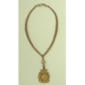 A 9ct gold graduated Albert fob chain, 39cm, JG&S, with attached 9ct gold monogram engraved pierced ... 