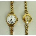 A lady's 18ct gold Cyma watch with bevelled circular case on a 9ct gold loop and bead bracelet strap... 