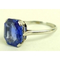 A platinum and sapphire dress ring, the single octagonal cut cornflower coloured sapphire, possibly ... 