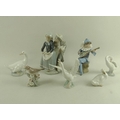 A collection of Lladro and Nao figurines comprising Lladro figure 'Boy Meets Girl', 1188, Nao figure... 