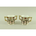 A pair of Royal Crown Derby loving cups in the Imari pattern number 1128, 7.5cm. (2)
