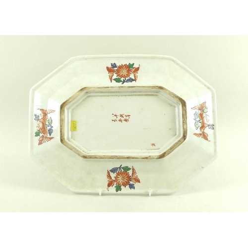 529 - A Chinese porcelain octagonal platter, the body painted with flowering foliage in blue, read, yellow... 