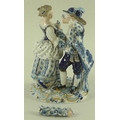 A 19th century Meissen porcelain figure group of a courting couple holding between them a garland of... 