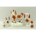A Staffordshire ceramic figure of a King Charles spaniel, standing with bocage at feet, 13cm, togeth... 