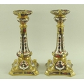 A pair of Royal Crown Derby candlesticks, Imari pattern 1128, each 27cm high. (2)