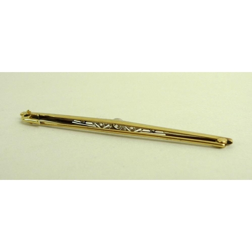 779 - An 18ct gold, platinum and diamond Art Deco bar brooch, set with five old brilliant cut diamonds, ce... 