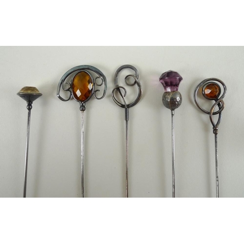 780 - A large collection of Edwardian and later hat pins, including three Charles Horner silver hat pins, ... 