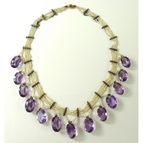 784 - A late Victorian, seed pearl and amethyst fringe style necklace with triple strand of seed pearls bo... 