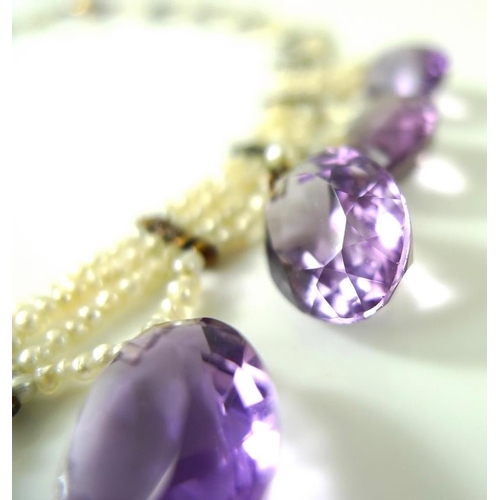 784 - A late Victorian, seed pearl and amethyst fringe style necklace with triple strand of seed pearls bo... 