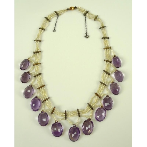 784 - A late Victorian, seed pearl and amethyst fringe style necklace with triple strand of seed pearls bo... 