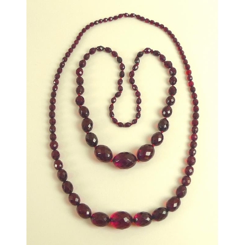 785 - Two similar strands of vintage facet cut amber beads of graduated size, one strand with seventy five... 