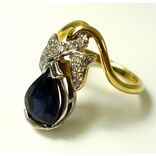 786 - An 18ct gold, diamond and sapphire ring of unusual hand crafted organic design, the teardrop shaped ... 