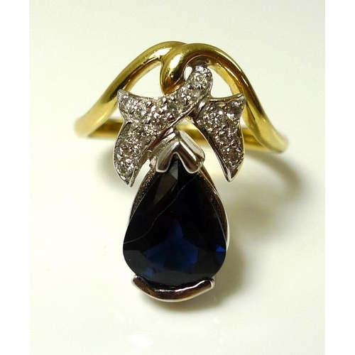 786 - An 18ct gold, diamond and sapphire ring of unusual hand crafted organic design, the teardrop shaped ... 