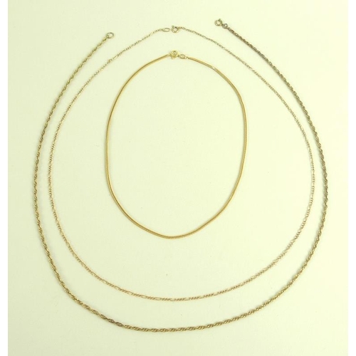 787 - An 18ct gold chain, 5g, together with two 9ct gold chains, 10.1g. (3)