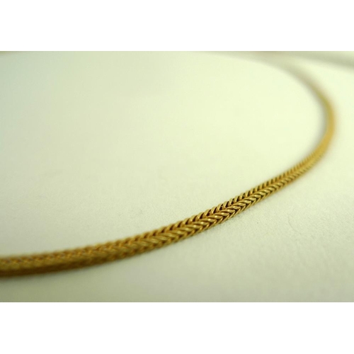 787 - An 18ct gold chain, 5g, together with two 9ct gold chains, 10.1g. (3)